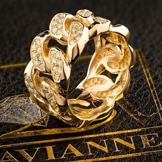 DESCRIPTION: The new cuban link ring is well known throughout all of our loyal customers and will surely add a luxurious touch to your look! It۪s artfully crafted in solid 14k yellow gold and is highly polished to a shimmering finish. This luxury piece showcases 1.23 carat of dazzling VS2-SI1 clarity diamonds, weighing 12 grams this ring will make you the spotlight of all attention. DETAILS: Item Code RNG0078 Diamond Carat Weight 1.23ctw Diamond Clarity VS1, VS2 Diamond Color G, H Metal Color Ye Cuban Link Ring, Link Ring, Vs2 Diamond, Linking Rings, Cuban Link, Diamond Color, Diamond Carat, Diamond Clarity, Metal Color