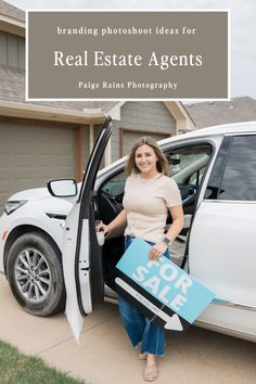 a woman standing in the open door of her car holding a real estate agent sign