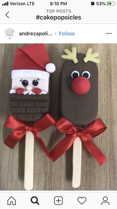 two pops decorated to look like santa and reindeer