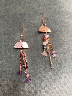 Dangling Bohemian rose gold beaded earrings. Purple and white glass beads with amethyst and Rose quartz stone beads. Bohemian Rose Gold Dangle Earrings, Bohemian Rose Gold Wire Wrapped Earrings, Gold Beaded Earrings, Amethyst And Rose Quartz, Gold Bead Earrings, Handmade Rose, Rose Gold Beads, Earrings Purple, Rose Quartz Stone