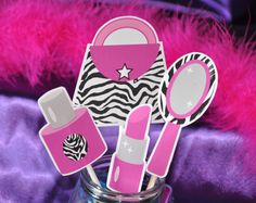 pink and zebra print items in a jar on purple furnishing with star stickers