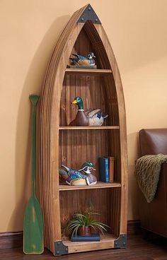 Rustic Canoe. Paddle Shaped Shelf, Corner Shelf Boat, Narrowboat Shelves, Nautical Corner Shelves, Boat Shape Book Shelf, Reclaimed Boat Furniture, Boat Shelf Decor, Shelf Cabin, Canoe Shelf