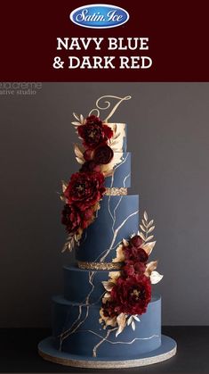 a three tiered blue cake with red flowers on it's side and gold accents