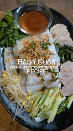 a bowl filled with meat and veggies on top of a table