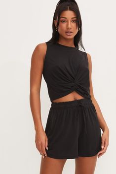 Trina Lounge Shorts in Black – Nell and Rose Short Workout Tops With Elastic Waistband, Versatile Black Crop Top For Loungewear, Black Athleisure Pajama Shorts With Elastic Waistband, Crop Top With Built-in Shorts For Loungewear, Short Athleisure Crop Top For Loungewear, Black Sleeveless Crop Top For Loungewear, Sleeveless Black Crop Top For Loungewear, Black Short Length Tops For Loungewear, Athleisure Short Crop Top For Loungewear