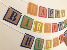 a birthday banner that says happy birthday hudson