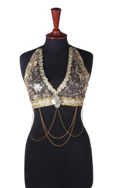 GOTHIC STEAMPUNK HALTER TOPS EMBELLISHED WITH TRIMS, COINS, CHAINS ETC. SIZES: S/M ; L/XL BUST SIZE S/M 36" ; L/XL 40" UNDER BUST SIZE S/M 33" ; L/XL 37" BLOUSE LENGTH FROM SHOULDER TO BOTTOM S/M ; L/XL 14.5" NOT WASHABLE DRY CLEAN ONLY PLEASE CHOOSE THE CORRECT SIZE ACCORDING TO YOUR SIZE PLEASE NOTE THAT THE DESIGN OF THE HALTER TOP WONT BE EXACTLY SAME AS IN PICTURE AS THE MATERIAL AND FABRIC KEEPS CHANGING BUT OVERALL LOOK WILL BE THE SAME AND PRETTY ----------------------------------------- Feather Fashion, Gothic Steampunk, Halter Tops, Strong Colors, Ribbon Trim, Women's Costumes, Blouse Length, Belly Dance, Halter Top