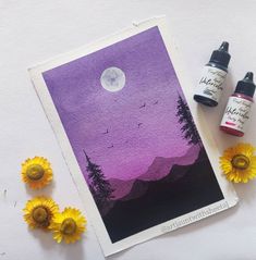 some yellow flowers and two ink bottles on a white surface with a purple sky in the background