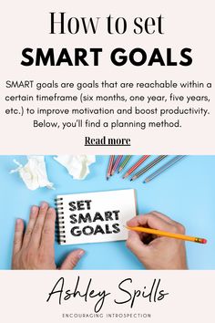 someone is writing on a notebook with the text how to set smart goals in front of them