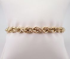 14K Yellow Gold Rope Chain Bracelet. This bracelet is 14K Yellow Gold, weighs 7.3 grams, measures 6.5 mm in width and measures 7" in length. This bracelet will be accompanied by an appraisal by a GIA Certified Diamond Grader with the retail replacement value of $1,495.00. I will ship this bracelet promptly in a gift box. ADDITIONAL REQUESTS If you would like to see more pictures of this item, please let us know and we would be happy to provide them for you. Please contact us with all questions, Classic Rope Chain Bracelets For Formal Occasions, Classic Formal Rope Chain Bracelets, Classic Formal Rope Chain Bracelet, Formal Yellow Gold Rope Chain Bracelet, Formal 14k Gold Bracelets With Rope Chain, Formal Rope Chain Bracelet Jewelry, Formal Rope Chain Bracelet, Gold Rope Chains, Fine Jewelry Gift