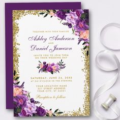 wedding card with purple flowers and gold glitter