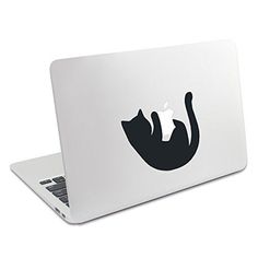 an apple laptop with a black cat decal on it