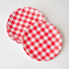 two red and white checkered paper plates