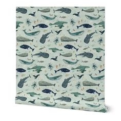 a blue and white wallpaper with whales on the side, in different colors