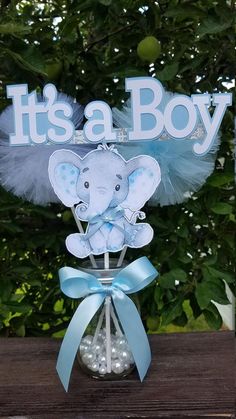 it's a boy elephant centerpiece with blue tulle