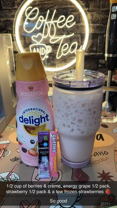 a drink and some snacks on a table