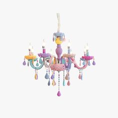 a pink chandelier with lots of colorful lights hanging from it's sides