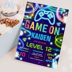 a game on birthday party with cupcakes, cake and other items in a box