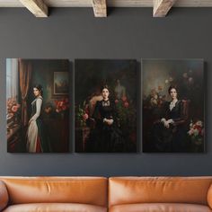 three paintings hang on the wall above a couch in front of a brown leather sofa