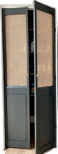 an open door with woven panels on the side and bottom panel is shown in black