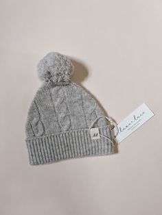 Introducing our delightful cable knit baby beanie, the perfect accessory to keep your little one cozy and stylish. Crafted with utmost care, this beanie is made from 100% Merino wool, ensuring exceptional warmth and comfort for your precious bundle of joy. Designed with a classic cable knit pattern, this beanie showcases a timeless style that complements any outfit. The intricate detailing adds a touch of sophistication to your baby's ensemble, making them the center of attention wherever they g Knitted Baby Beanies, Cable Knit Pattern, Toddler Education, Eco Friendly Christmas, Baby Bottoms, Mommy And Me Outfits, Special Occasion Outfits, Baby Warmer, Pom Beanie