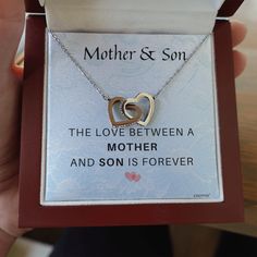 ♥ Mother Son Necklace:- The love between a mother and son is forever♥ Mother Birthday Gift From Son: - Two hearts embellished with Cubic Zirconia stones, interlocked together as a symbol of never-ending love. Made with high-quality brass over white and rose gold plating. The cable chain measures 16 inches with a 2-inch extension and fastens with a lobster clasp.♥ Mother’s Day Present From Son: - When you wear this mother-son jewelry close to your heart, it lovingly collapses time and space if yo Double Heart Cubic Zirconia Jewelry For Mother's Day, Silver Necklace For Mother's Day, Silver Necklaces For Mother's Day, Mother's Day Double Heart Cubic Zirconia Jewelry, Sterling Silver Necklaces For Mother's Day, Sterling Silver Jewelry For Mother's Day, Silver Jewelry For Valentine's Day, Cubic Zirconia Infinity Jewelry For Mother's Day, Infinity Cubic Zirconia Necklace For Mother's Day