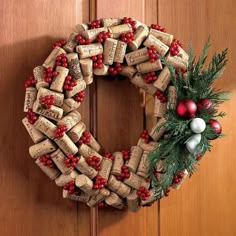 a christmas wreath made out of wine corks