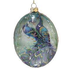 a glass ornament with a peacock on it's back hanging from a chain