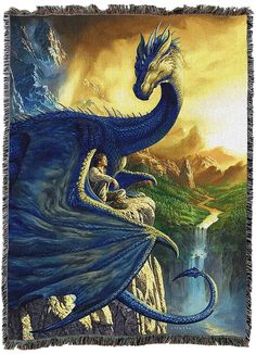 a blue dragon is sitting on the edge of a cliff, with a man in it's lap