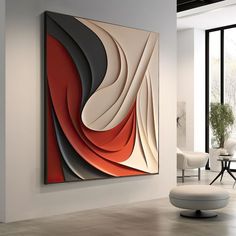 an abstract painting hangs on the wall in a modern living room