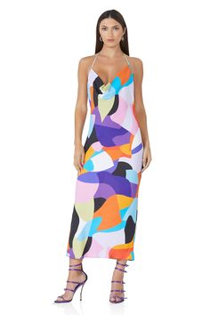 The Rowland halter neck midi dress is a bias cut silhouette with a plunging cowl neckline in an abstract color block print. The open back and adjustable halter neck tie ensure this sexy number stays tailored to your needs. * Abstract Color Block * Midi length * Fitted silhouette * Halter Neck Midi Dress, Abstract Color, Cowl Neckline, Fitted Silhouette, Halter Neck, Bold Colors, Midi Length, Block Print, Neck Tie