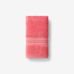 a pink towel on a white background