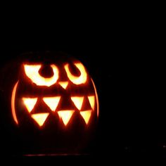 a carved pumpkin sitting on top of a table