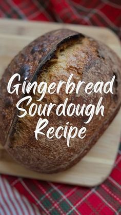 a close up of a loaf of bread on a cutting board with the words gingerbread sourdough recipe