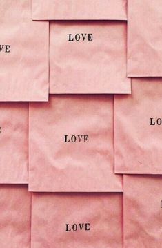 pink paper with words written on it that read love, love, and lov