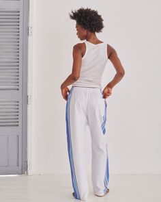 Our Classic Trousers have a relaxed, baggy fit that combines comfort and style, featuring our signature contrast stripe along the side of the leg. Equipped with three practical pockets, an elasticated waistband and a convenient drawstring, they are trousers you'll want to live in. Originally inspired by Kenyan Kikoy fabric. Kikoy Fabric, Classic Lounge, Classic Trousers, New Classic, Lounge Pants, Baggy Fits, Women's Trousers, Mens Bottom, Trousers Women