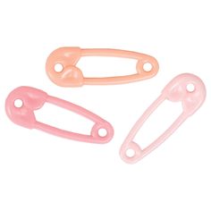 three pink plastic handles and hooks on a white background