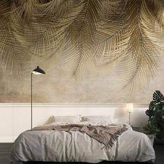 a bedroom with palm leaves on the wall