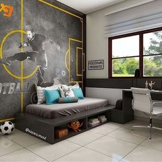 a bedroom with a football theme painted on the wall