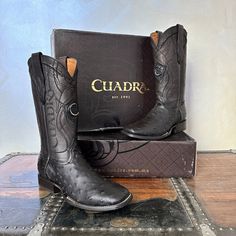 "A true pioneer in luxury exotic boots, Cuadra is committed in creating innovative designs using avant-garde technologies and an artisan concept for each pair of hand-crafted boots. Famously known for the quality of their genuine leathers, each natural mark is a reminder of the care that goes into leaving the essence of the leather in its truest form. MADE IN MEXICO Brand: Cuadra For: Men (view size chart) Details: Sku: 3Z1OA1 Color: Black Genuine Ostrich Full Quill Leather Wide Square Toe 12\" Leather Shaft 1.5\" Heel Leather Sole Leather Lining Laser & Embroidery Contact us for more details PLEASE READ BEFORE PURCHASE: The picture is an ACCURATE REPRESENTATION. Colors in the pictures may vary a little by effects of light. Leather color can vary from the pictures due to the nature of the Luxury Men's Square Toe Boots, Luxury Men's Square Toe Cowboy Boots, Luxury Hand Tooled Men's Boots, Luxury Men's Cowboy Boots With Leather Sole, Luxury Men's Cowboy Boots With Leather Footbed, Luxury Men's Closed Toe Cowboy Boots, Luxury Western Men's Boots, Cuadra Boots, Roper Boots