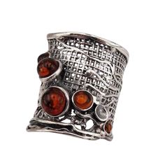 Wide nest Band Sterling Silver Ring made of Amber Gemstone  Meticulously handcrafted in Israel for exceptional quality. Each piece is made to order with meticulous attention to detail.  MATERIAL & DIMENSIONS Metal: Sterling silver 925 Gemstone: Amber Gemstone Dimensions: Front Width: 24mm / 0.944in  Back Width: 5mm / 0.196in  Front Ring Heights: 24mm CUSTOMIZATIONS: Explore our 14K Gold option for a luxurious upgrade.  Available in other gemstones for personalized style. RING SIZE: Custom-made t Wide Silver Ring, Amber Gemstone, Silver Jewelry Design, Amber Ring, Textured Ring, Unisex Ring, Amber Jewelry, Simple Jewelry, Boho Hippie