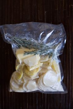 a bag of cheese sitting on top of a wooden table