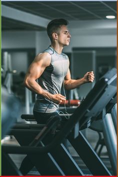 a man running on a treadmill in the gym