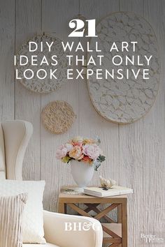 a white chair sitting next to a table with flowers on it and the words 21 diy wall art ideas that only look expensive