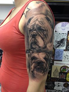 a woman with a bulldog tattoo on her arm