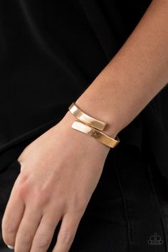 Two oversized gold ribbons delicately overlap across the center of the wrist, creating a stylish and stackable bangle-like cuff. Features a hinged closure.

Sold as one individual bracelet. Sell Jewelry, Stackable Bangles, Bangles Design, Mixed Metal Jewelry, Gold Bracelet Cuff, Gold Cuffs, Bracelet Online, Hinged Bracelet, Bangle Designs