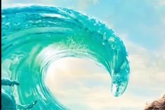 an image of a large blue wave in the ocean with water splashing on it