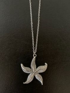 "Large nicely detailed silver tone starfish necklace, starfish necklace, starfish pendant, necklace starfish, silver starfish, beach necklace, ocean necklace, star fish  Pendant measures 2\" L X 1 3/4\" W.  Choice of chain length.   ★ Want to see more?  Please visit my shop at: https://www.etsy.com/shop/DesignsByPeg" Silver Starfish Jewelry For Beach, Ocean-inspired Silver Necklace With Star Charm, Silver Starfish Charm Jewelry, Ocean Necklace, Necklace Star, Dream Date, Beach Necklace, Fish Pendant, Starfish Pendant