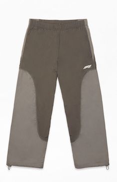 PacSun Exclusive! Experience unmatched style with the Formula 1 x PacSun Slipstream Pants. These pants combine a comfortable elastic stretch waistline, convenient side pockets, athletic seams, a lightweight feel, and a standard fit, all highlighted by the distinctive F1 logo at the hip and an adjustable drawcord hem for a personalized touch.


	Elastic stretch waistline
	Side pockets
	Standard fit
	Left hip logo
	Athletic construction
	Drawcord hem F1 Logo, My Mobile Number, Tech Pack, Streetwear Aesthetic, Athletic Fits, Rhubarb, Pacsun, Formula 1, Black Pants