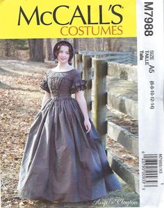 a woman in a dress and hat standing next to a fence with the words mccall's costumes on it